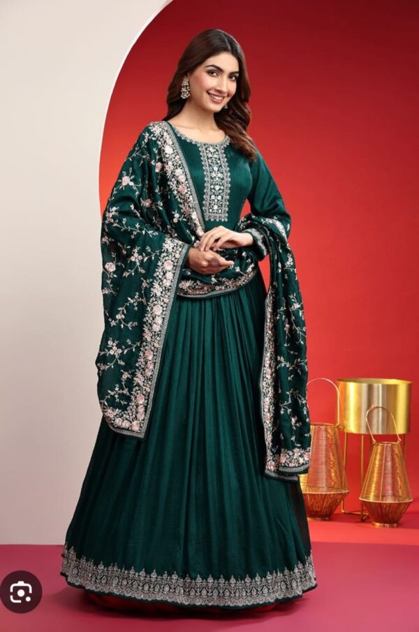 GREEN DESIGNER SUIT WITH HANDMADE ETHNIC WORK